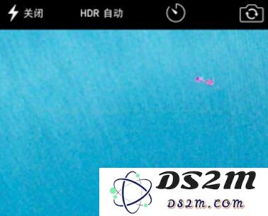 iPhone 拍照出现小红点是什么情况？